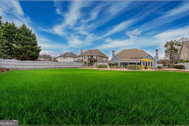 view of yard with fence