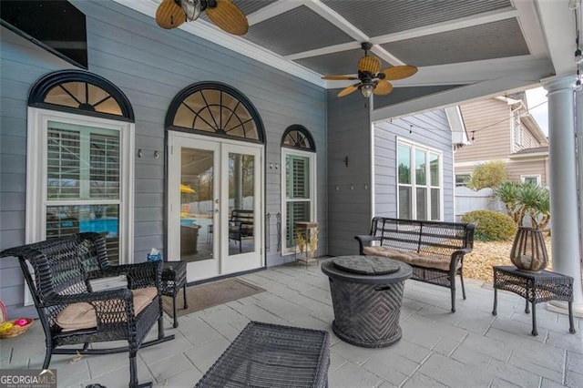 view of patio / terrace with french doors and a ceiling fan