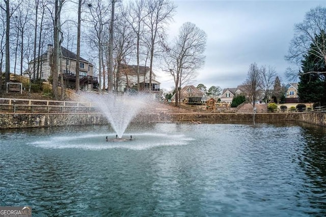 property view of water featuring a residential view