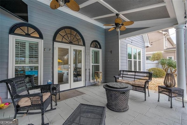 view of patio / terrace with ceiling fan and french doors