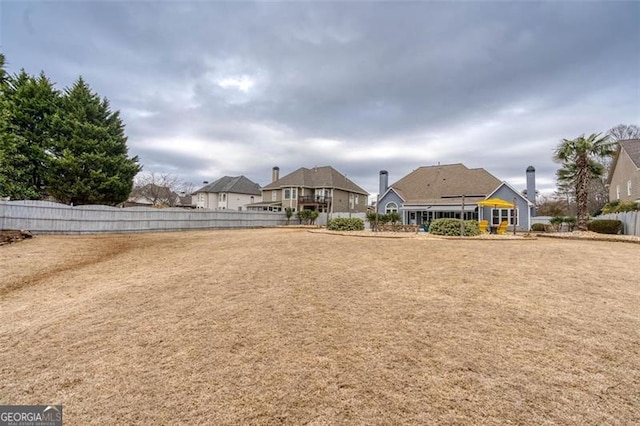 view of yard with fence