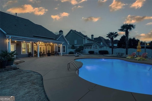 view of pool with a patio, fence, and a fenced in pool