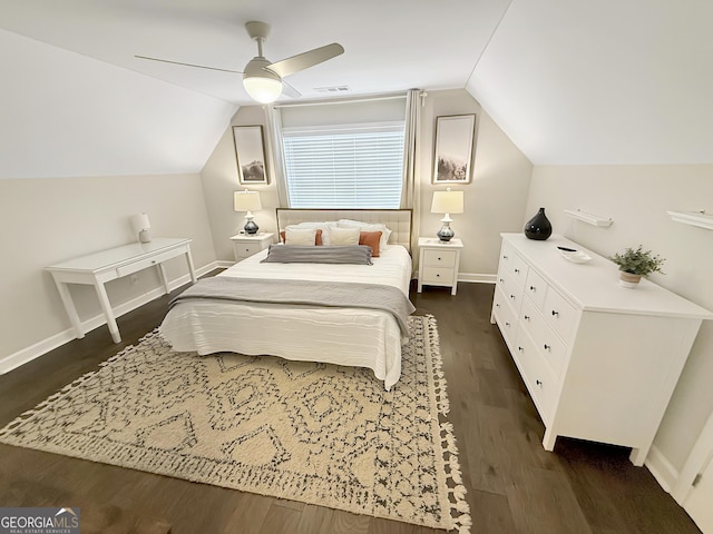 bedroom featuring dark wood-style floors, lofted ceiling, visible vents, ceiling fan, and baseboards