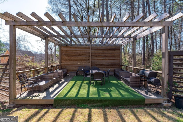 view of yard featuring a deck, outdoor lounge area, and a pergola