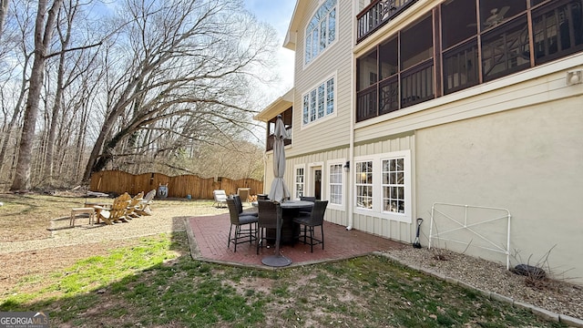 view of patio / terrace featuring fence