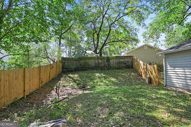 view of yard featuring a fenced backyard