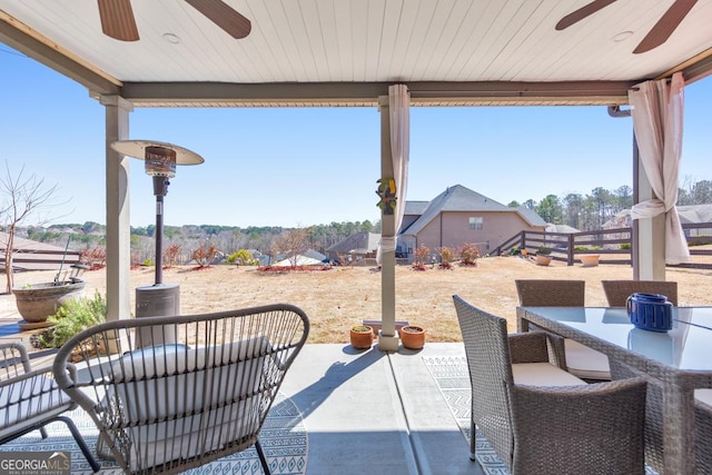 view of patio / terrace with outdoor dining area and ceiling fan