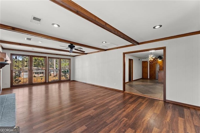 unfurnished living room featuring beam ceiling, visible vents, ceiling fan, wood finished floors, and baseboards