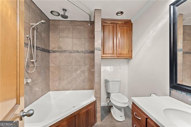 bathroom with toilet, tile patterned flooring, baseboards, and vanity