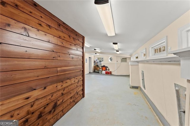 hallway featuring concrete flooring