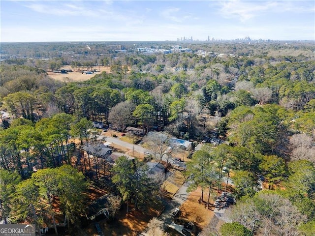 drone / aerial view with a forest view