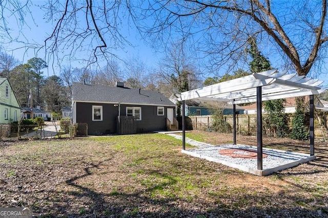 view of yard featuring a fenced backyard and a pergola