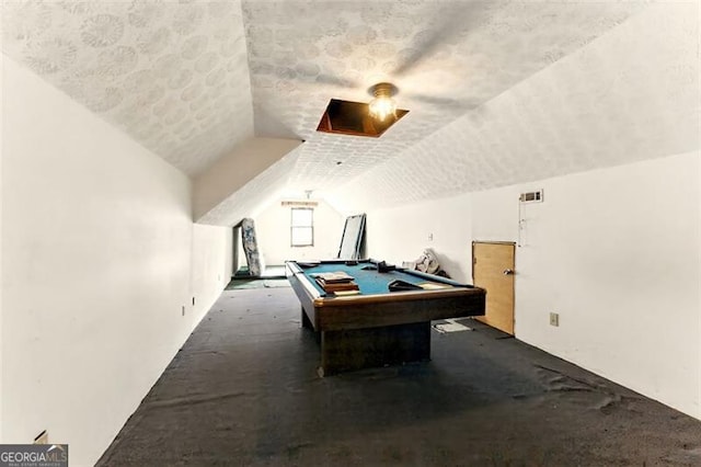 1505 Ozora Rd, Loganville, GA 30052 - playroom with lofted ceiling, billiards, visible vents, and a textured ceiling
