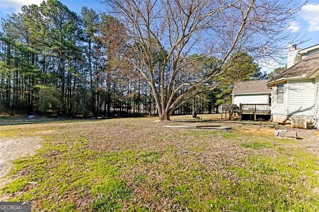 1505 Ozora Rd, Loganville, GA 30052 - view of yard with a deck