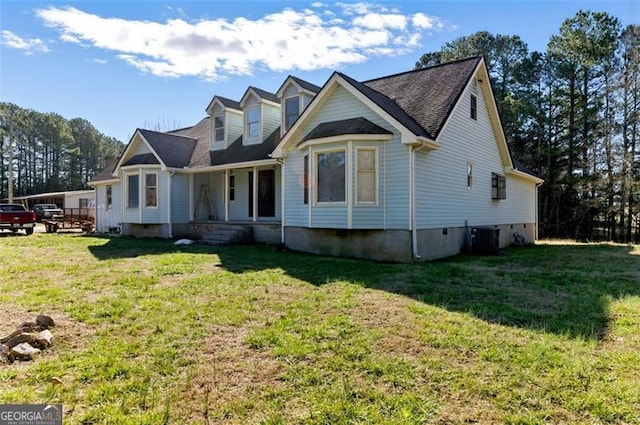 1505 Ozora Rd, Loganville, GA 30052 - view of front of property featuring cooling unit and a front lawn