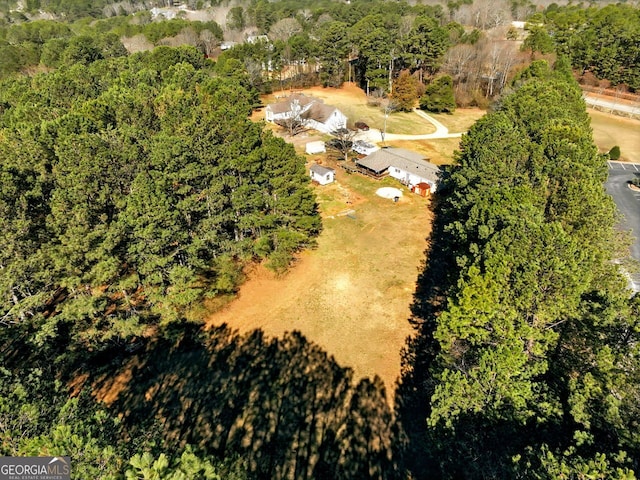 1505 Ozora Rd, Loganville, GA 30052 - drone / aerial view featuring a forest view