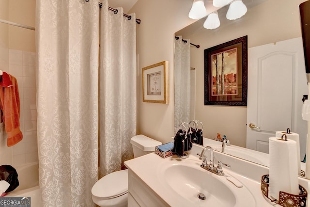 bathroom with vanity, toilet, and shower / bathtub combination with curtain