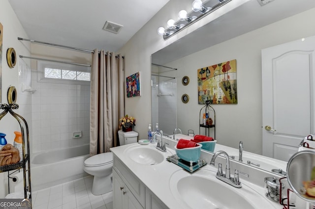 bathroom with shower / tub combo with curtain, visible vents, a sink, and toilet