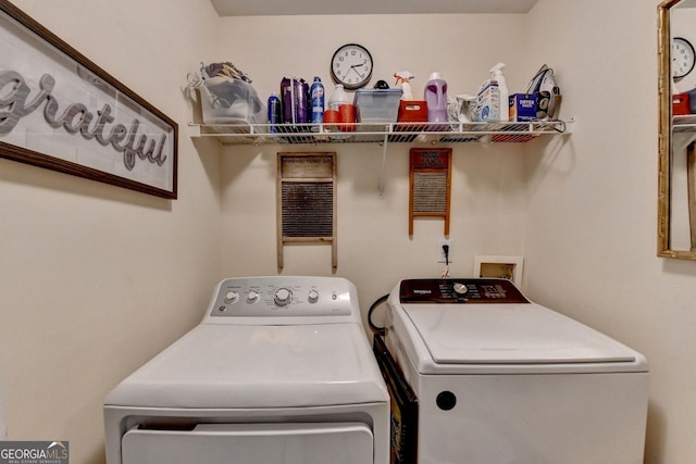 clothes washing area with laundry area and washing machine and dryer