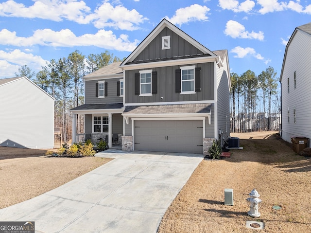 view of front of house with a porch, board and batten siding, central AC, a garage, and driveway