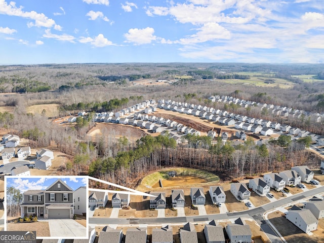 drone / aerial view with a residential view