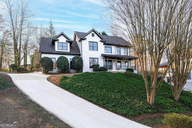 160 Deer Cliff Cv, Lawrenceville, GA 30043 - view of front of house featuring a porch, driveway, and roof with shingles