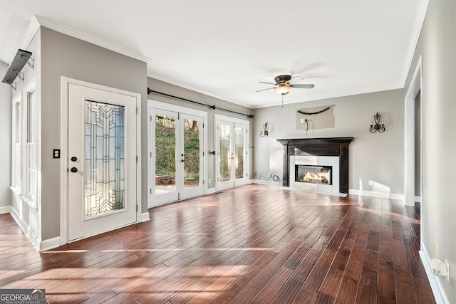 160 Deer Cliff Cv, Lawrenceville, GA 30043 - unfurnished living room featuring crown molding, wood finished floors, and ceiling fan