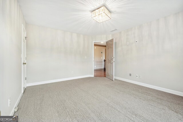 160 Deer Cliff Cv, Lawrenceville, GA 30043 - unfurnished room featuring carpet flooring, visible vents, and baseboards