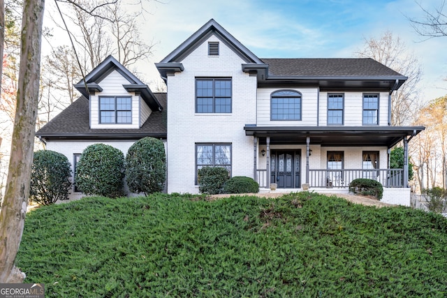 160 Deer Cliff Cv, Lawrenceville, GA 30043 - view of front of property featuring brick siding, covered porch, and a shingled roof