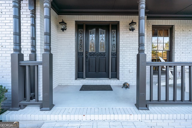 160 Deer Cliff Cv, Lawrenceville, GA 30043 - entrance to property featuring brick siding and covered porch