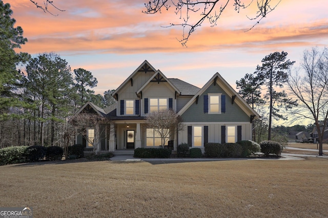 craftsman-style house with a front yard