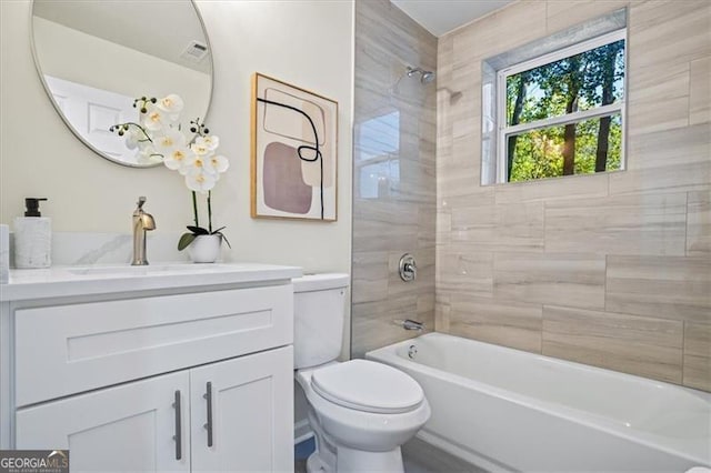 1270 Graymont Dr, Atlanta, GA 30310 - full bathroom featuring visible vents, toilet, shower / bath combination, and vanity