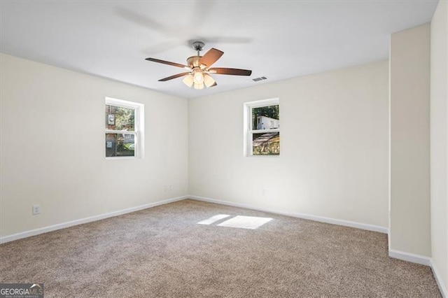 1270 Graymont Dr, Atlanta, GA 30310 - carpeted spare room featuring baseboards, ceiling fan, and visible vents