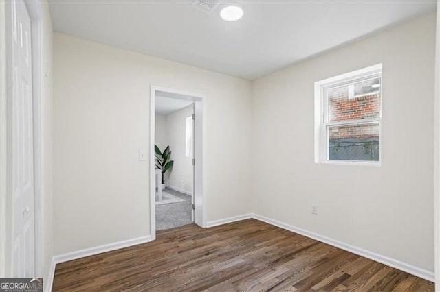 1270 Graymont Dr, Atlanta, GA 30310 - spare room featuring dark wood finished floors and baseboards