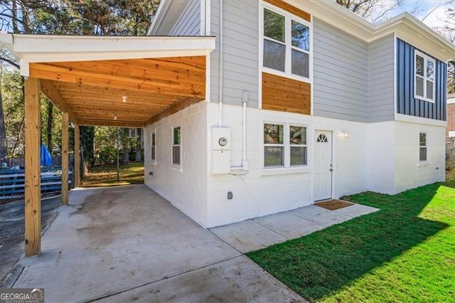 1270 Graymont Dr, Atlanta, GA 30310 - view of property exterior featuring driveway, crawl space, a yard, and a carport