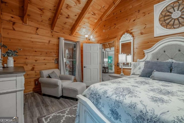 bedroom with vaulted ceiling with beams, wood finished floors, wood ceiling, and wooden walls