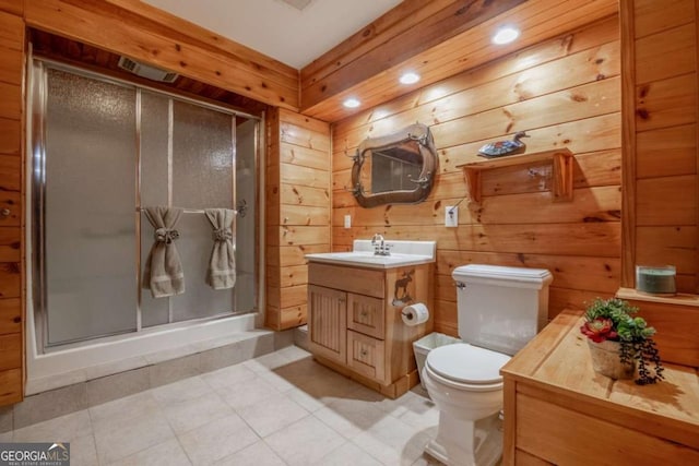 full bath with toilet, wood walls, a shower stall, and vanity