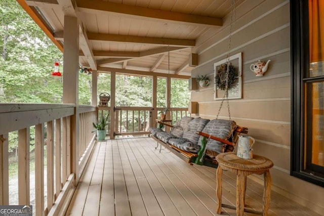 deck featuring covered porch