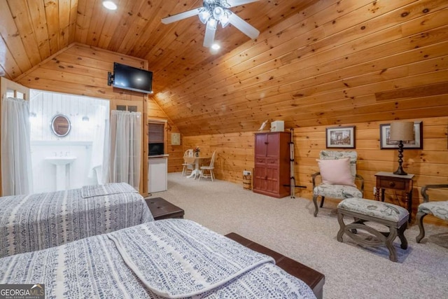 carpeted bedroom with lofted ceiling, wood walls, and wooden ceiling