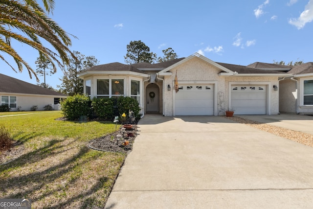 single story home featuring a garage, roof with shingles, driveway, and a front lawn