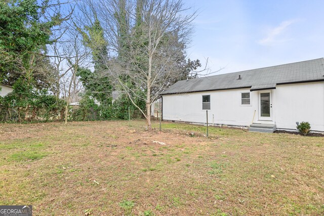 view of yard with entry steps