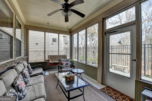 back of property featuring a patio and a sunroom