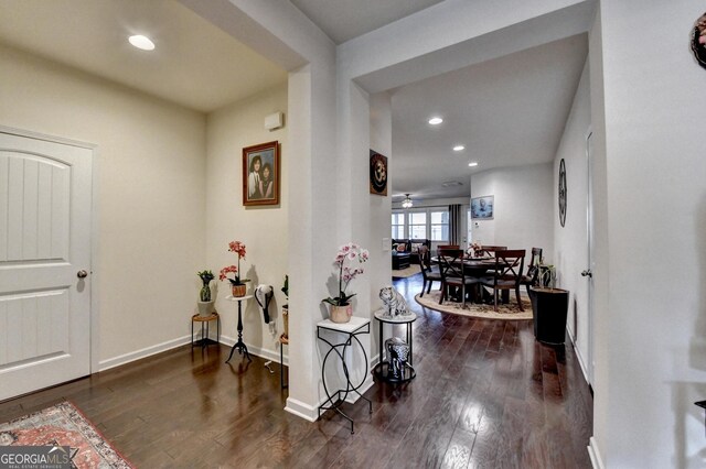 foyer entrance featuring baseboards, recessed lighting, and wood finished floors