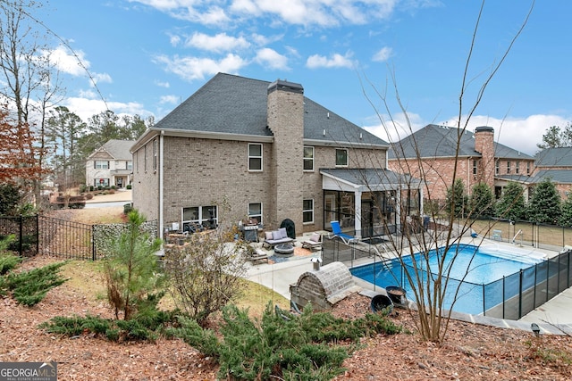 view of pool featuring a fenced backyard, a fenced in pool, and a patio