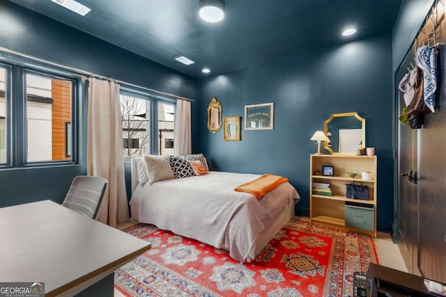 bedroom featuring visible vents and recessed lighting