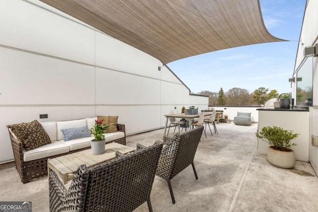 view of patio / terrace featuring outdoor dining area, outdoor lounge area, and exterior kitchen