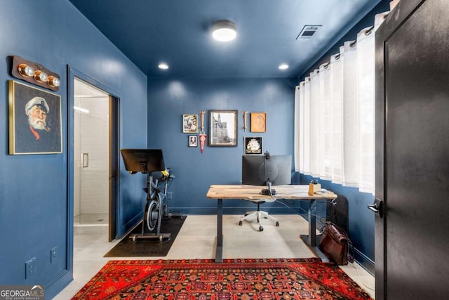 office with baseboards, visible vents, and recessed lighting