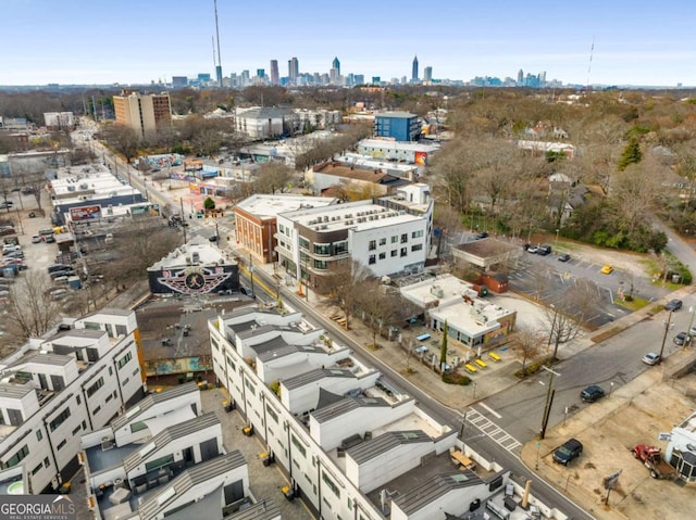 birds eye view of property with a city view