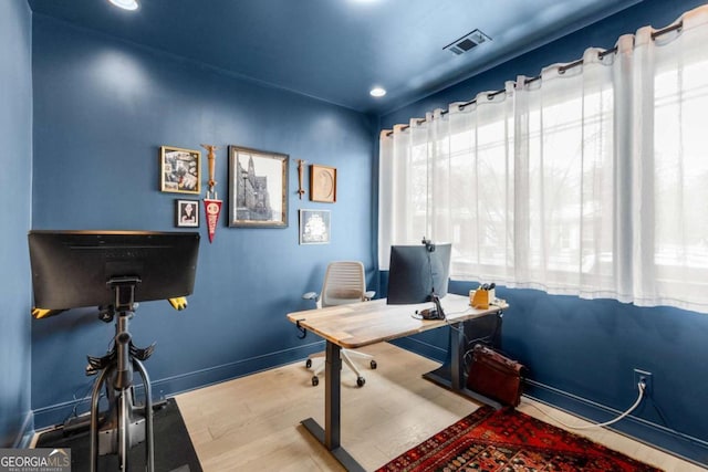 office with recessed lighting, wood finished floors, visible vents, and baseboards