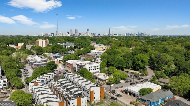 drone / aerial view featuring a city view